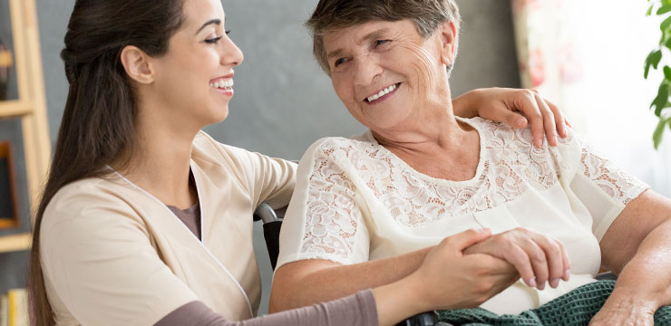 Smiling Nurse and Patient